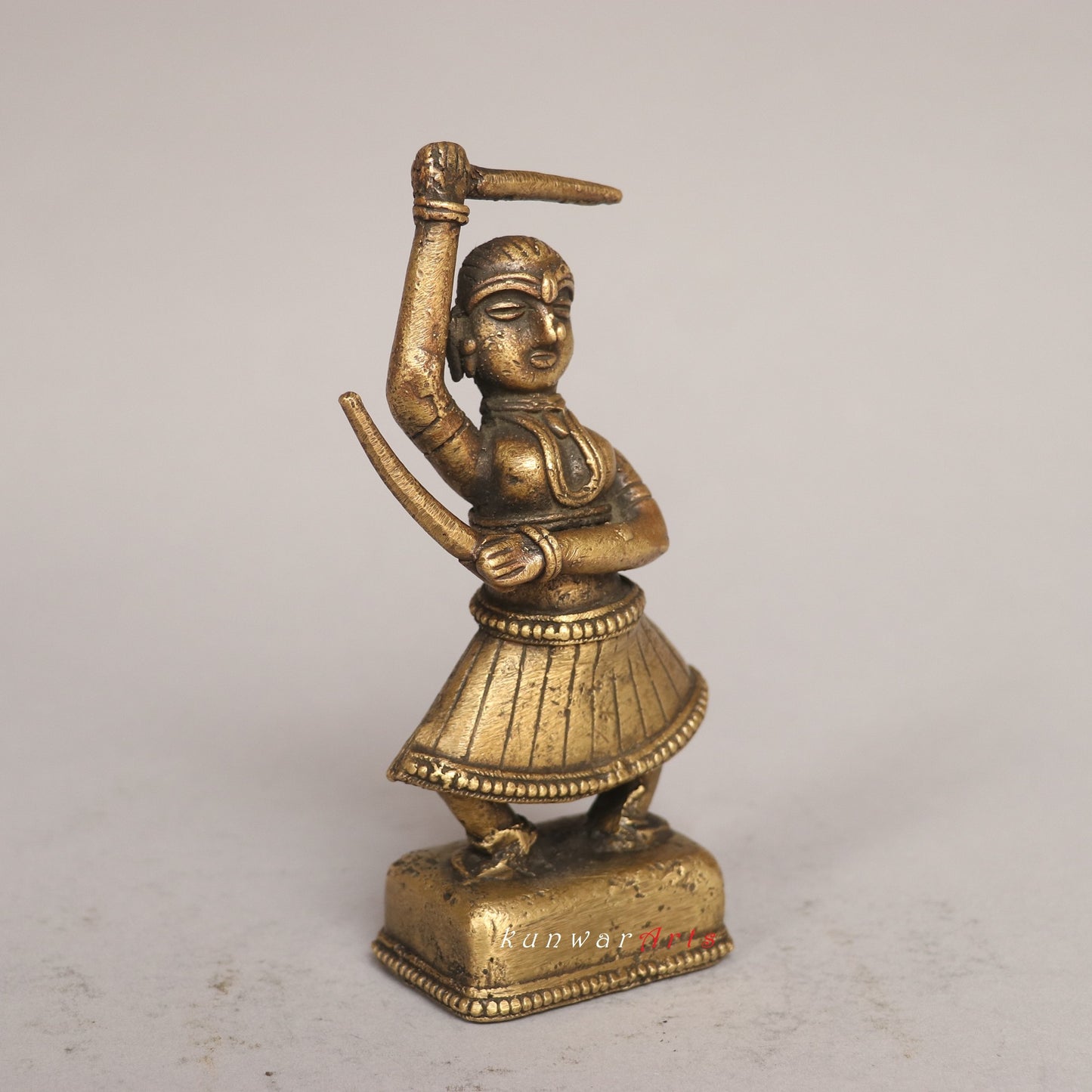 The Grace of Brass: A Look at the Exotic Female Sword Dancer Figurine