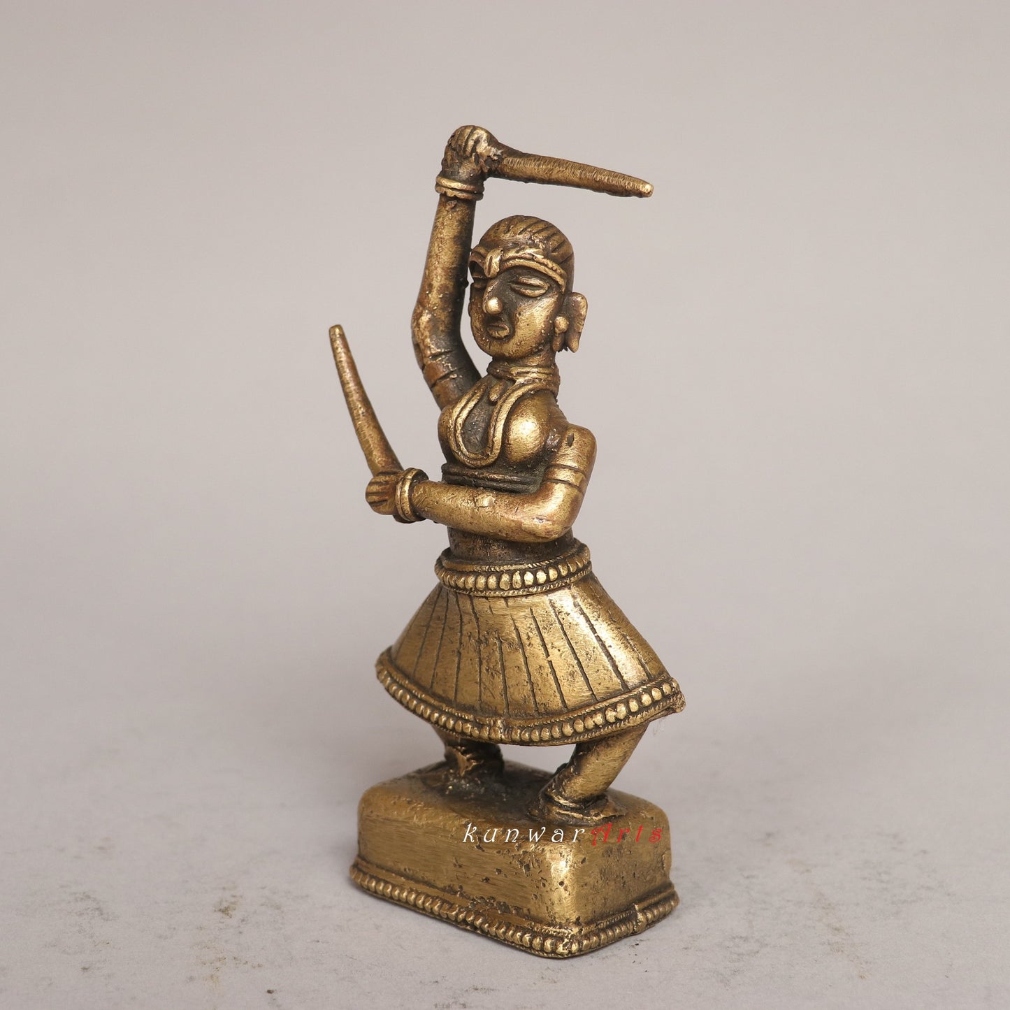 The Grace of Brass: A Look at the Exotic Female Sword Dancer Figurine
