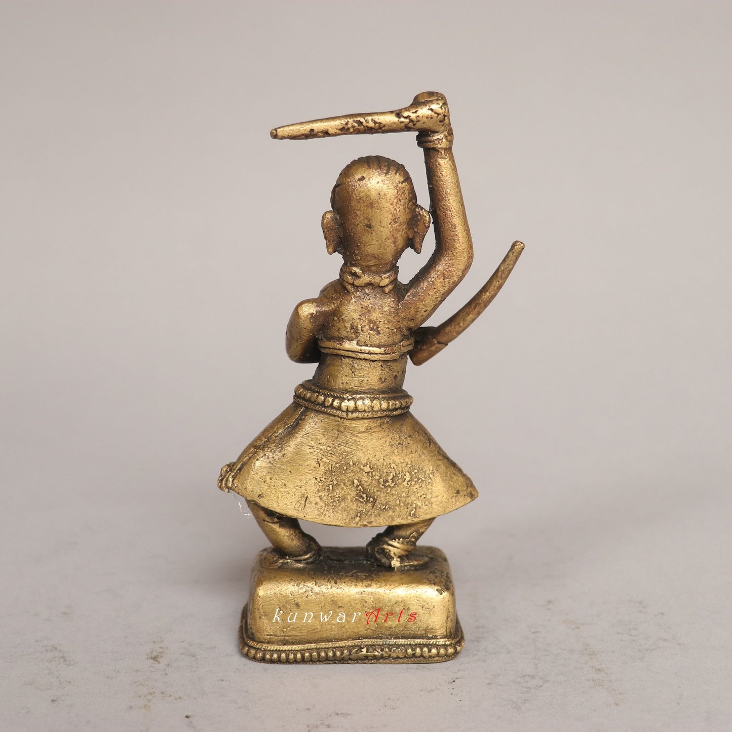 The Grace of Brass: A Look at the Exotic Female Sword Dancer Figurine