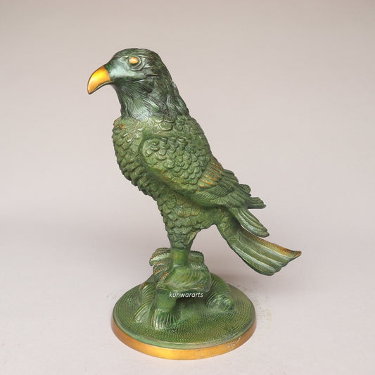 Green eagle statue on a white background