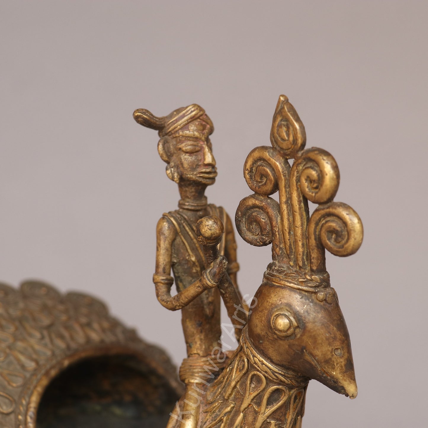 Handcrafted Dokra Tribal Figurine with Peacock Vessel
