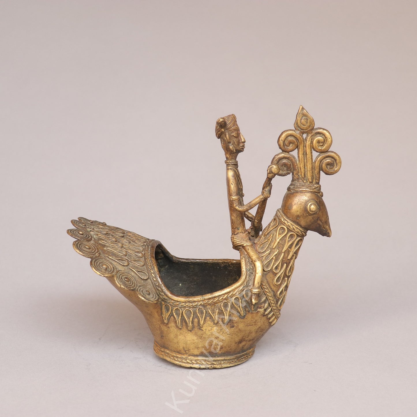 Handcrafted Dokra Tribal Figurine with Peacock Vessel