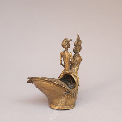Handcrafted Dokra Tribal Figurine with Peacock Vessel