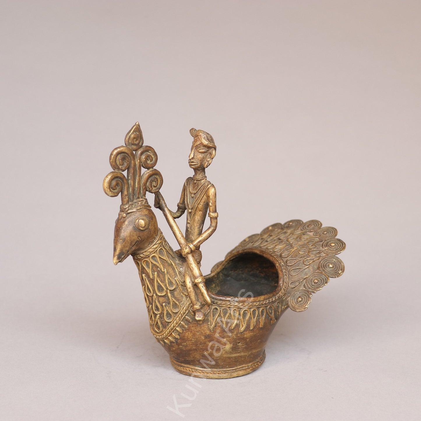 Handcrafted Dokra Tribal Figurine with Peacock Vessel
